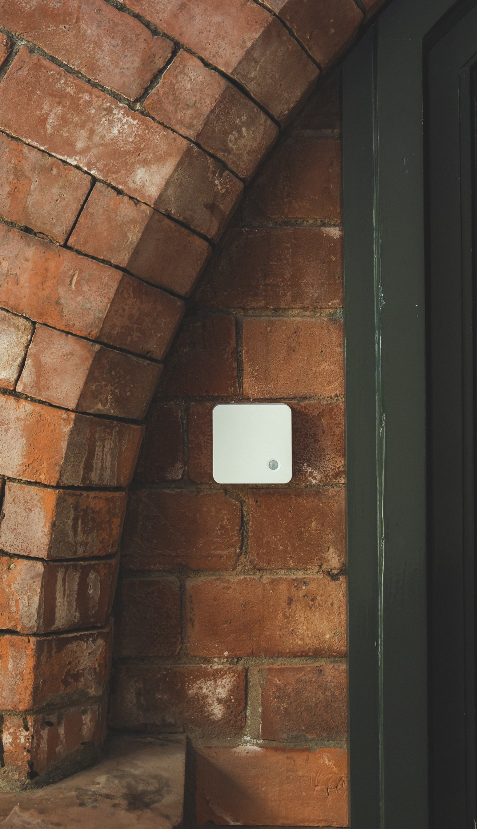 SmartWorkPlus Envionment Sensor on Brick Wall